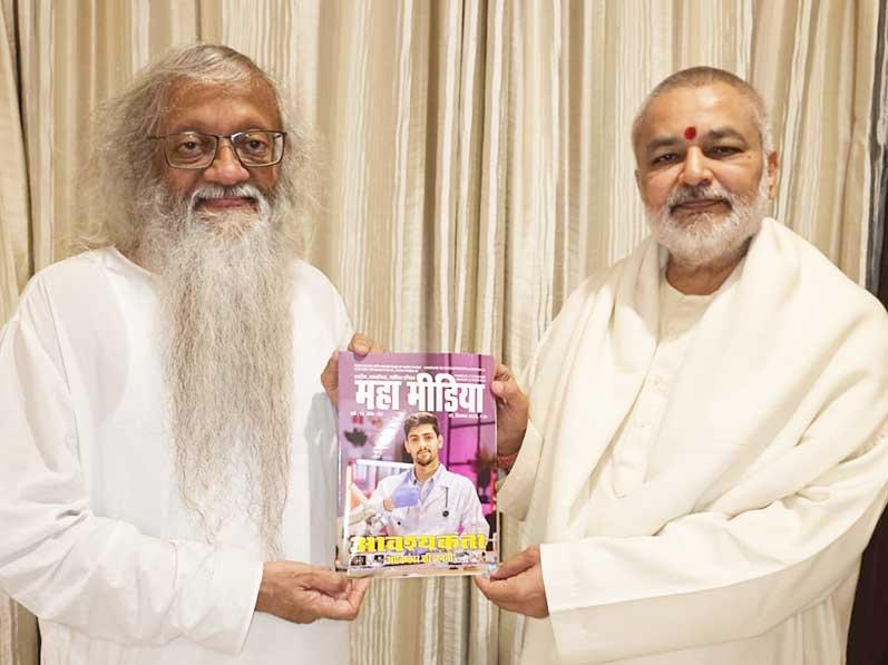 Brahmachari Girish Ji has presented his book ''Param Pujya Maharishi Mahesh Yogi ji ki Deviya Chhatra Chhaya mein Brahmachari Girish'' to Dr. Brahmachari Girish Momaya Ji, Director of Maharishi European Research University, The Netherlands. Brahmachari Girish Ji has also presented December 2023 edition of National Family Monthly Magazine ''Maha Media''