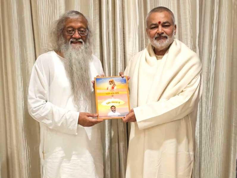 Brahmachari Girish Ji has presented his book ''Param Pujya Maharishi Mahesh Yogi ji ki Deviya Chhatra Chhaya mein Brahmachari Girish'' to Dr. Brahmachari Girish Momaya Ji, Director of Maharishi European Research University, The Netherlands. Brahmachari Girish Ji has also presented December 2023 edition of National Family Monthly Magazine ''Maha Media''