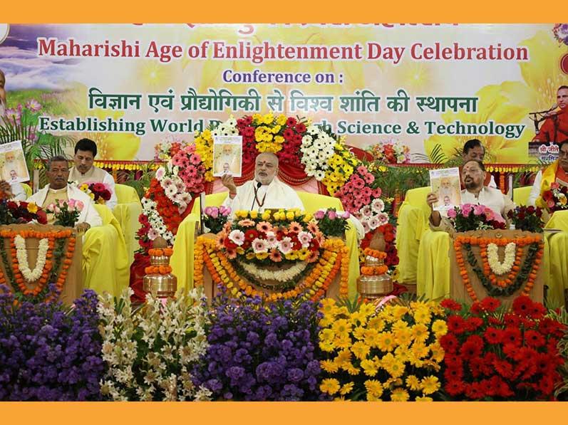 Brahmachari Girish Ji and other dignitaries releasing Maharishi World Peace Movement quarterly newsletter.