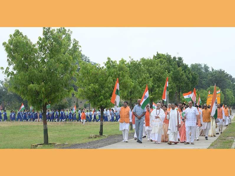 A Tiranga Yatra was organised by Maharishi Centre for Education Excellence (MCEE) at Bhopal. Over 1000 members of Maharishi Organisation including Brahmachari Girish Ji, Prof. Bhuvnesh Sharma, Mrs. Rekha Nimkar, all directors and members of MVM National Office, faculty of Maharishi Institute of Management, teachers and students of MCEE, and Mahamedia Group members have participated in the Yatra. At the end of Yatra Brahmachari Girish Ji has addressed the assembled members and said that Its a very good sankalpa of having flag on each home, each building of India Ghar Ghar Tiranga.