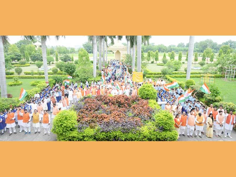A Tiranga Yatra was organised by Maharishi Centre for Education Excellence (MCEE) at Bhopal. Over 1000 members of Maharishi Organisation including Brahmachari Girish Ji, Prof. Bhuvnesh Sharma, Mrs. Rekha Nimkar, all directors and members of MVM National Office, faculty of Maharishi Institute of Management, teachers and students of MCEE, and Mahamedia Group members have participated in the Yatra. At the end of Yatra Brahmachari Girish Ji has addressed the assembled members and said that Its a very good sankalpa of having flag on each home, each building of India Ghar Ghar Tiranga.