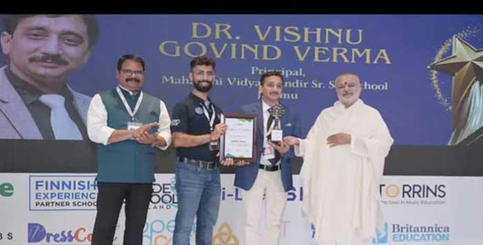 Dr. Vishnu Govind Verma, Principal, MVM Jammu received 
the prestigious award Edu-Icon of the Year 2025 instituted  
by the Global School Leaders Consortium GSLC from Dr. 
Girish Chandra Verma, Honble Chairman, MVM Schools 
Group. He also awarded the Ph.D in Commerce  from the 
Washington Digital University. 